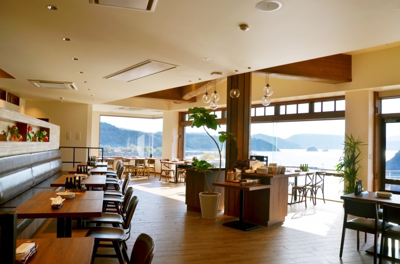 A photo of a cafe with a large window