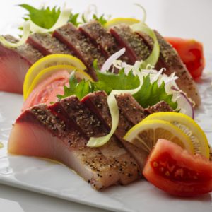 Olive hamachi covered with spices